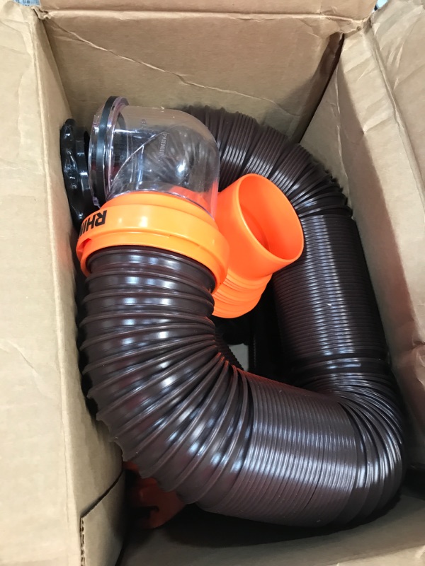 Photo 2 of Camco RhinoFLEX RV Sewer Hose Kit with Swivel Transparent Elbow and 4-in-1 Dump Station Fitting, Brown, 15 Feet (39770) 15ft Sewer Hose Kit Frustration-Free Packaging