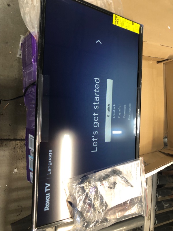 Photo 2 of RCA 32-inch Flat Screen 720p Roku Smart LED TV