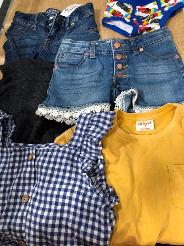 Photo 1 of BUNDLE OF CLOTHES - SIZES SMALL / MEDIUM7/8 / SSMALL 6/7 / 4T / 8