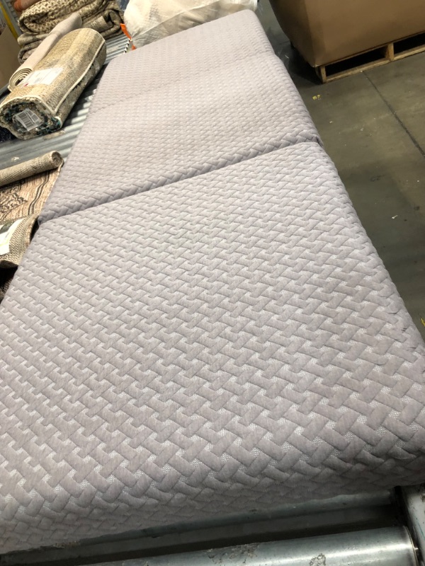 Photo 1 of **USED-NEEDS CLEANING**
Milliard Premium Folding Mattress 75' X 25' X4 