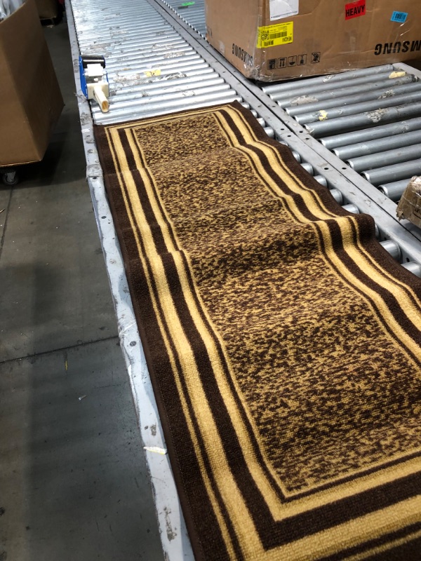 Photo 2 of **used-needs cleaning**
55 x 25 brown/gold runner carpet