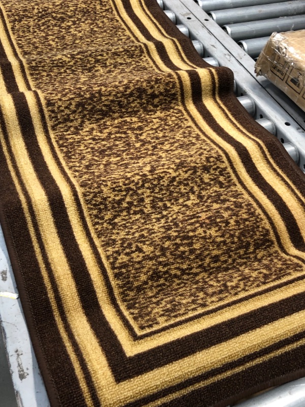 Photo 4 of **used-needs cleaning**
55 x 25 brown/gold runner carpet