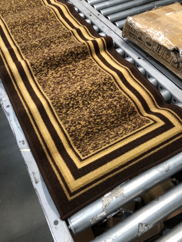 Photo 3 of **used-needs cleaning**
55 x 25 brown/gold runner carpet