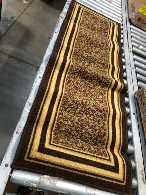 Photo 1 of **used-needs cleaning**
55 x 25 brown/gold runner carpet