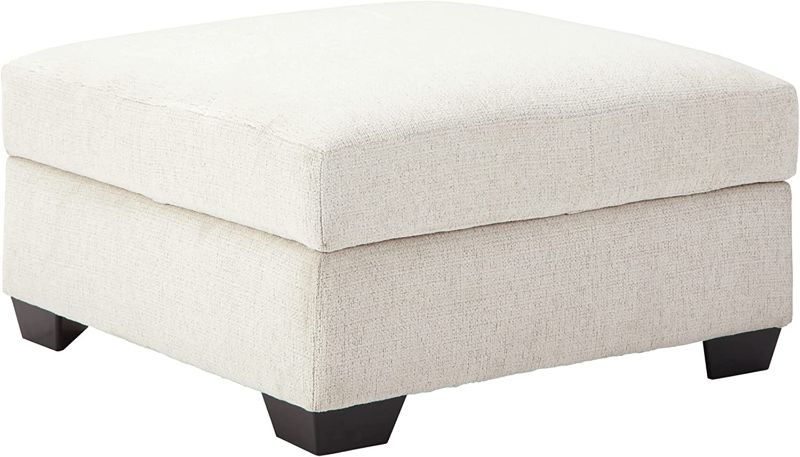 Photo 1 of *MINOR STAINS* Signature Design by Ashley Cambri Reversible Table Top Square Storage Ottoman with Cup Holders, White
