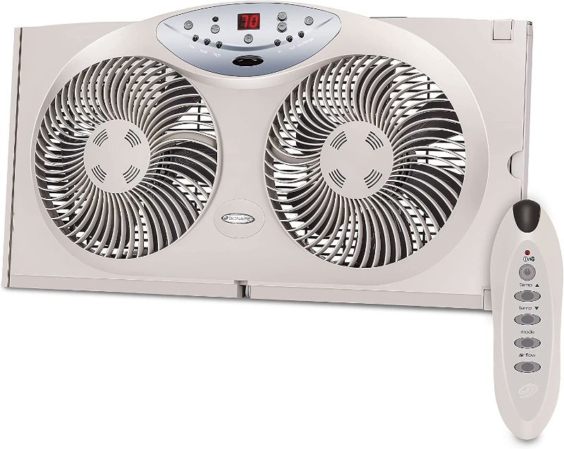 Photo 1 of **MINOR WOBBLE TO FAN BLADE* MISSING REMOTE*  Bionaire Window Fan with Twin 8.5-Inch Reversible Airflow Blades and Remote Control, White
