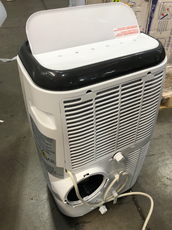 Photo 3 of **BLOWS COLD* BLACK+DECKER 8,000 BTU Portable Air Conditioner with Remote Control, White
