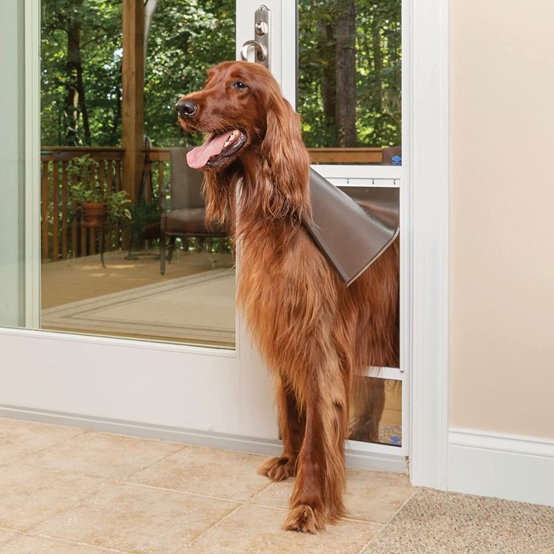 Photo 1 of **MINOR DAMAGE** PetSafe 1-Piece Sliding Glass Pet Door for Dogs & Cats - Adjustable Height 75 7/8" to 80 11/16" - Large-Tall, White, No-Cut Install, Aluminum Patio Panel Insert, Great for Renters or Seasonal Install
