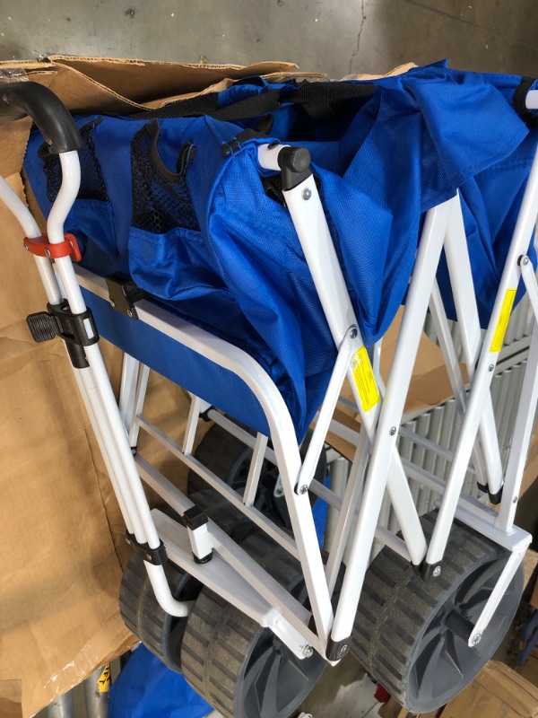 Photo 2 of **SMALL TEAR TO CARRY CASE** MacSports Heavy Duty Collapsible Folding All Terrain Utility Beach Wagon Cart, Blue/White
