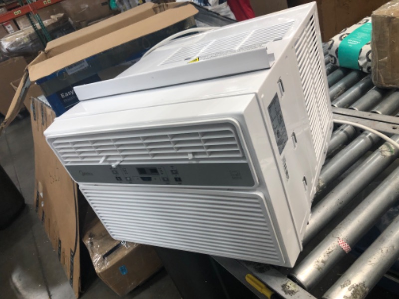 Photo 4 of ***PARTS ONLY*** Midea 12,000 BTU EasyCool Window Air Conditioner, Dehumidifier and Fan - Cool, Circulate and Dehumidify up to 550 Sq. Ft., Reusable Filter, Remote Control
- Missing/loose hardware // Minor cosmetic damaged 

