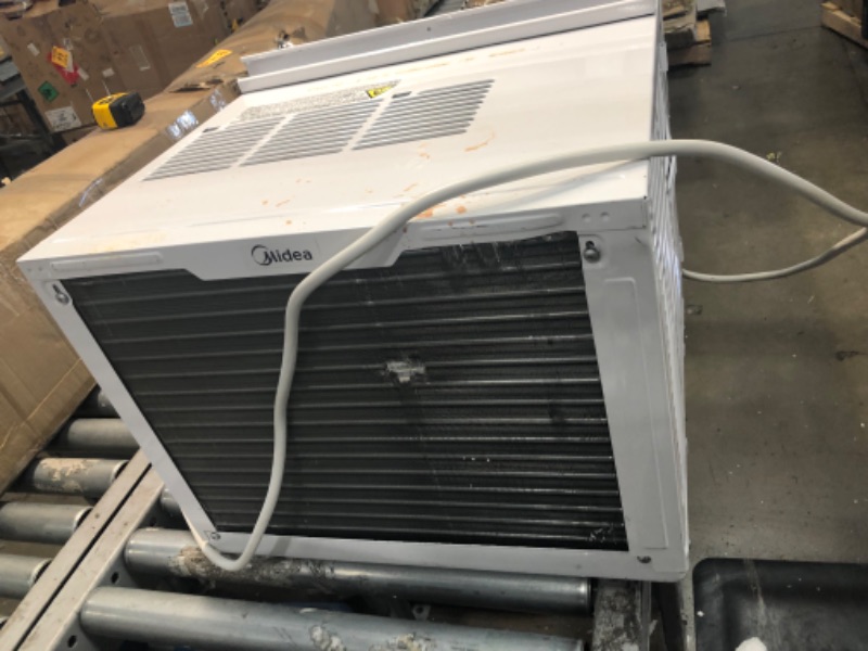 Photo 3 of ***PARTS ONLY*** Midea 12,000 BTU EasyCool Window Air Conditioner, Dehumidifier and Fan - Cool, Circulate and Dehumidify up to 550 Sq. Ft., Reusable Filter, Remote Control
- Missing/loose hardware // Minor cosmetic damaged 

