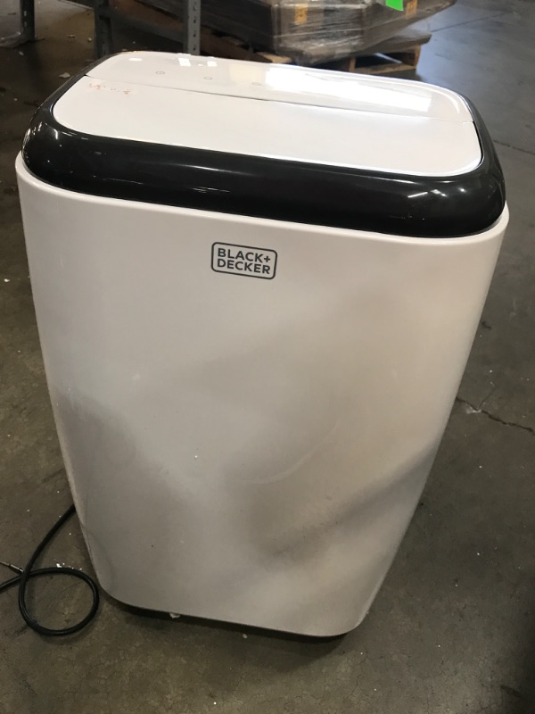 Photo 6 of **MINOR DAMAGE BLOWS COLD** Black+decker Bpp10hwtb Portable Air Conditioner with Heat and Remote Control, 10,000 BTU SACC/CEC (14,000 BTU Ashrae), Cools Up to 450 Square Feet, WH