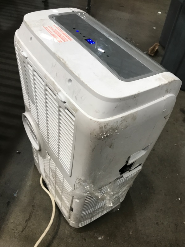 Photo 3 of **DAMAGED* MISSING PARTS * BLACK+DECKER 12,000 BTU Portable Air Conditioner with Heat and Remote Control, White
