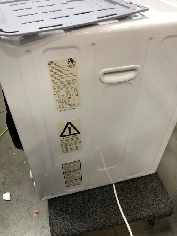 Photo 1 of **TESTED POWERS ON DOESNT SPIN* DAMAGED* BLACK+DECKER BCED37 Portable Dryer, Small, 4 Modes, Load Volume 13.2 lbs., White

