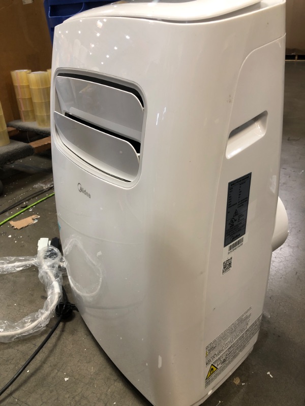 Photo 1 of **PARTS ONLY* NON FUNCTIONAL** Midea 3-in-1 Portable Air Conditioner, Dehumidifier, Fan, for Rooms Up to 200 Sq ft Enabled, 10,000 BTU Doe (5,800 BTU SACC) Control with R MAP10S1CWT