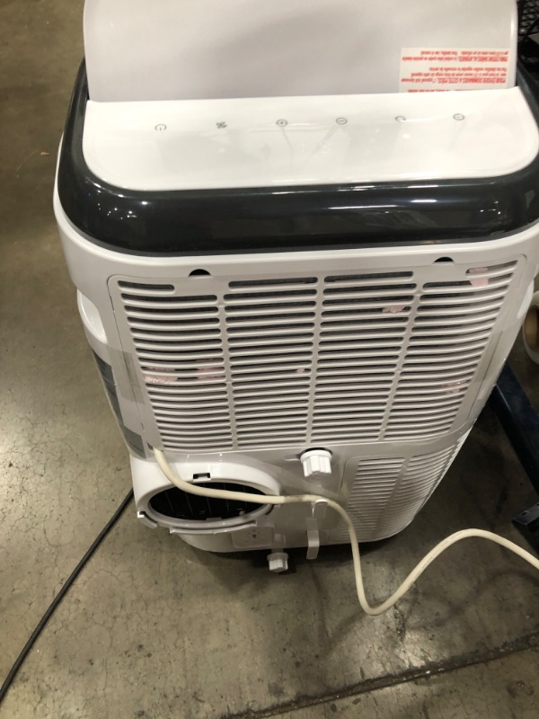 Photo 5 of **LEAKES WATER**
BLACK+DECKER 8,000 BTU Portable Air Conditioner with Remote Control, White
