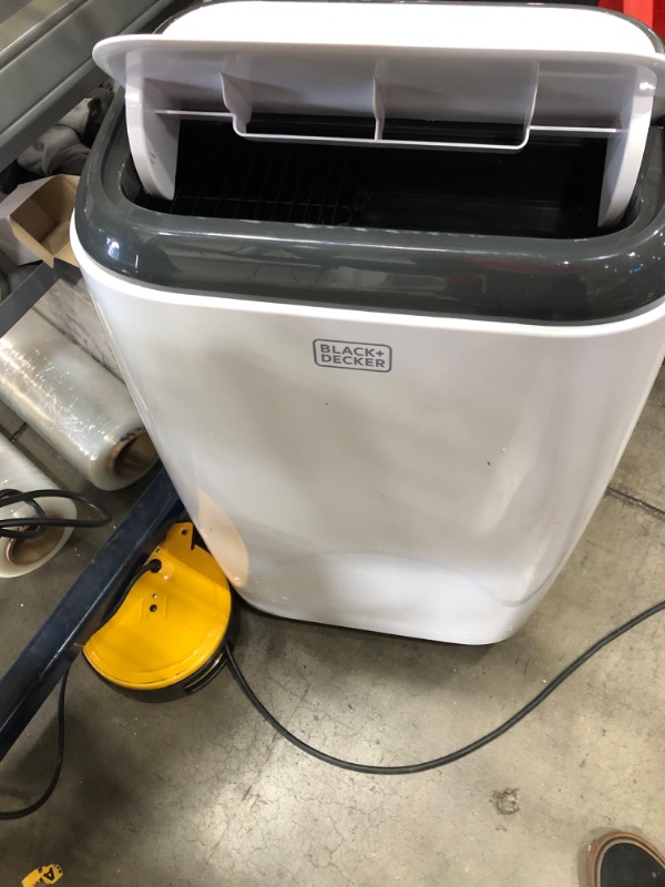 Photo 3 of **LEAKES WATER**
BLACK+DECKER 8,000 BTU Portable Air Conditioner with Remote Control, White
