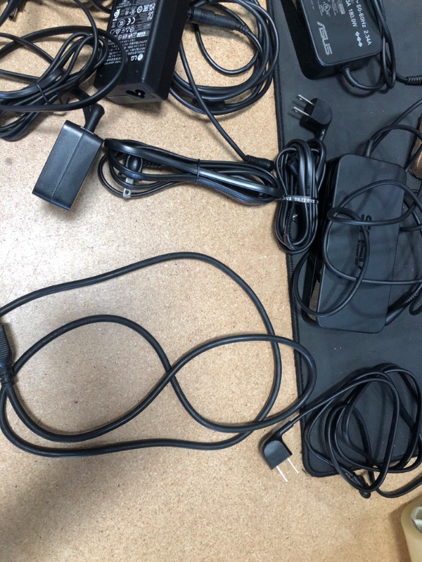 Photo 1 of bundle of power cords 
15 items 

-missing some components for the item to be fully functional 