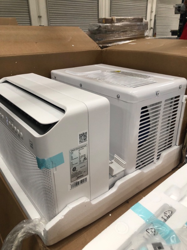 Photo 2 of **PARTS ONLY**
Midea 12,000 BTU U-Shaped Smart Inverter Window Air Conditioner–Cools up to 550 Sq. Ft., Ultra Quiet with Open Window Flexibility, Works with Alexa/Google Assistant, 35% Energy Savings, Remote Control
