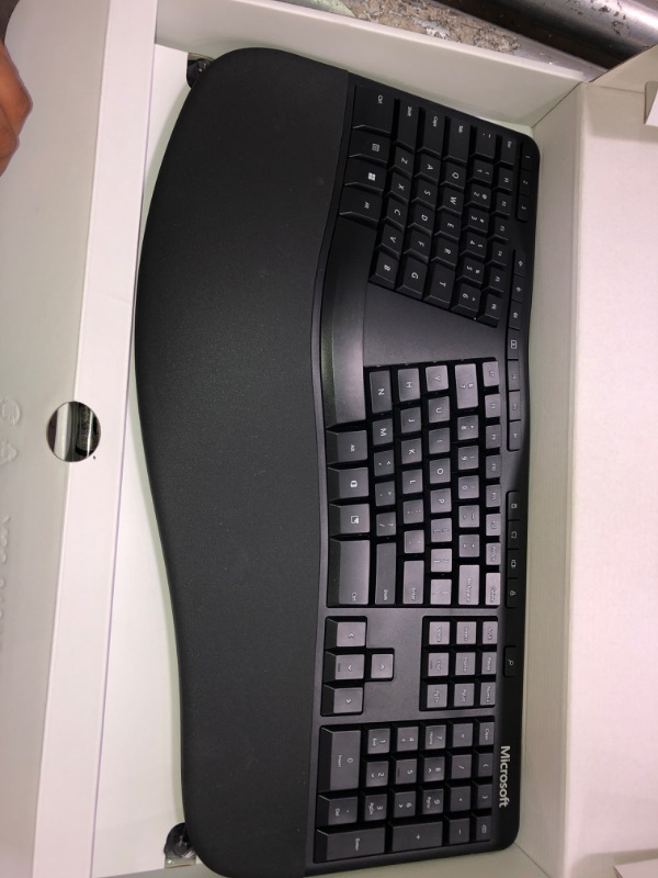 Photo 2 of Microsoft Ergonomic Keyboard - Black. Wired, Comfortable, Ergonomic Keyboard with Cushioned Wrist and Palm Support. Split Keyboard. Dedicated Office Key.
