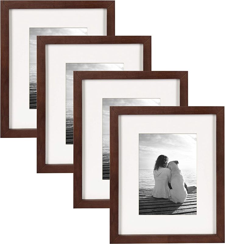 Photo 1 of **MINOR DAMAGE** DesignOvation Gallery Wood Photo Frame Set for Customizable Wall or Desktop Display, Walnut Brown 8x10 matted to 5x7, Pack of 4
