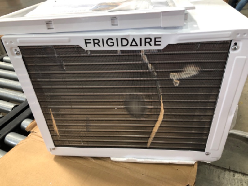 Photo 2 of **MINOR DAMAGE** Frigidaire 10,000 BTU 115V Window-Mounted Compact Air Conditioner with Remote Control, White
