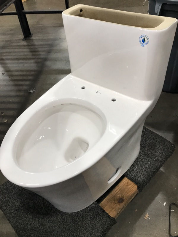 Photo 4 of **MISSING LID* SMALL CRACK* 12 In. Rough-In 1-piece 1 GPF/1.6 GPF Dual Flush Elongated Toilet in White, Seat Included