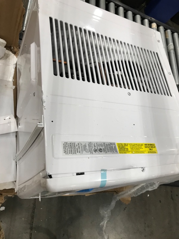 Photo 2 of **DAMAGED**MISSING PARTS**NON FUNCTIONAL* FRIGIDAIRE FFRS1022R1 10000 BTU 115-volt Slider/Casement Room Full-Function Remote Control Window Air Conditioner, 10,000, White
