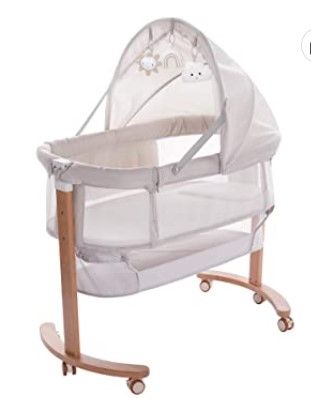 Photo 1 of Baby Bassinet Bedside Sleeper with Wheels Storage Basket Canopy 3 Hanging Toys Newborn Cosleeping Cribs for Infant Wooden Crib Adjustable Boy Girl Multi-Functional Bedside Sleeper
