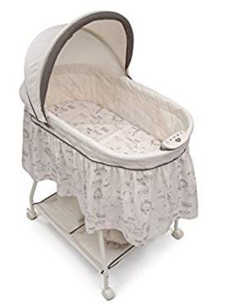 Photo 1 of Delta Children Deluxe Sweet Beginnings Bedside Bassinet - Portable Crib with Lights and Sounds, Playtime Jungle
