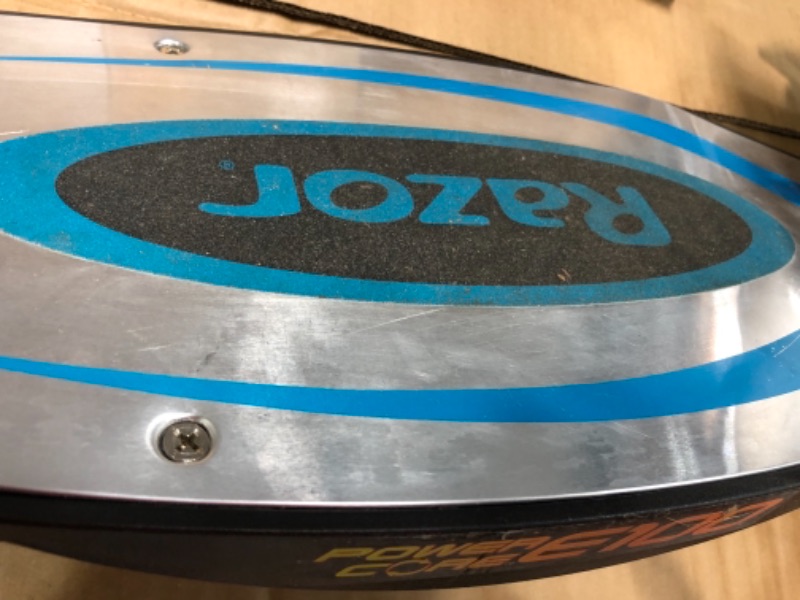 Photo 1 of Razor Power Core E100 Electric Scooter for Kids Ages 8+ - 100w Hub Motor, 8" Pneumatic Tire, Up to 11 mph and 60 min Ride Time, For Riders up to 120 lbs