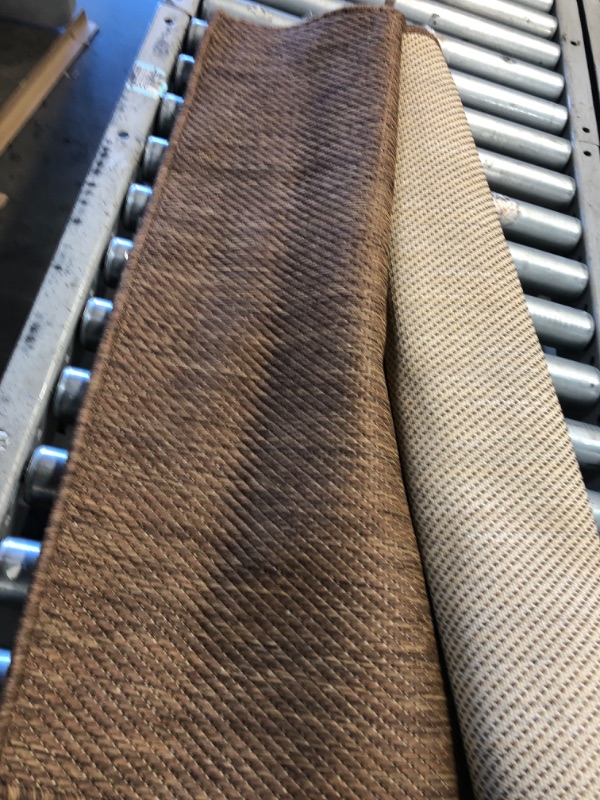 Photo 1 of 3'X7' BROWN AREA RUG 