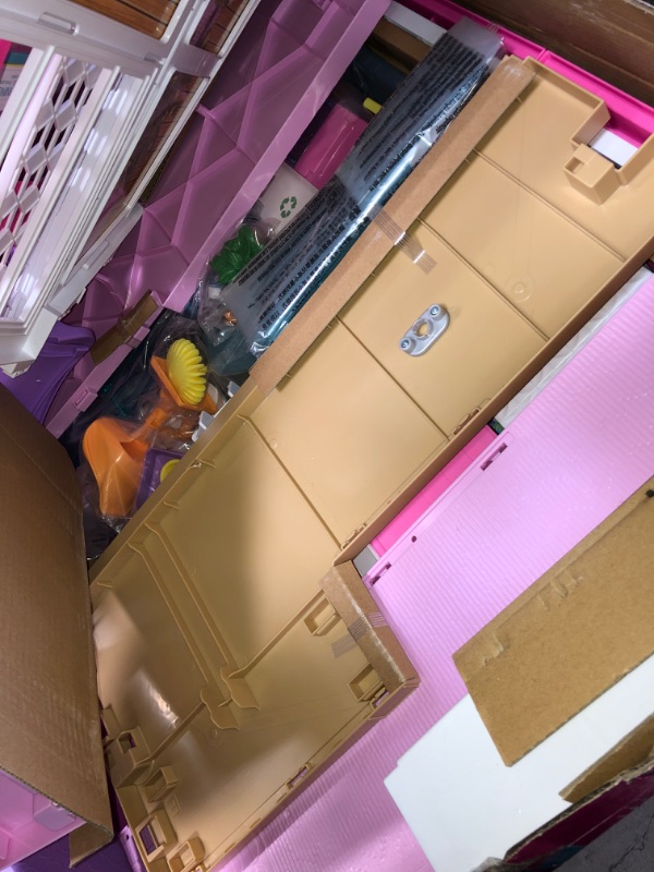 Photo 4 of Barbie Dreamhouse Dollhouse with Wheelchair Accessible Elevator, Pool, Slide and 70 Accessories Including Furniture and Household Items