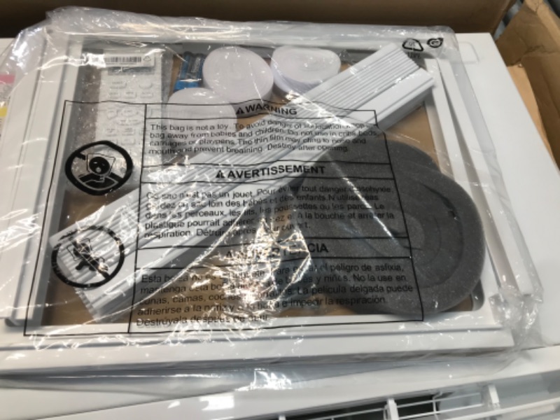 Photo 2 of ***PARTS ONLY*** GE PHC06LY 22" Room Air Conditioner with 6000 Cooling BTU Energy Star Certified Delay Timer Digital Time Temperature Display EZ Mount in White, 20.00 in (L) x 23.00 in (W) x 15.00 in (H)
