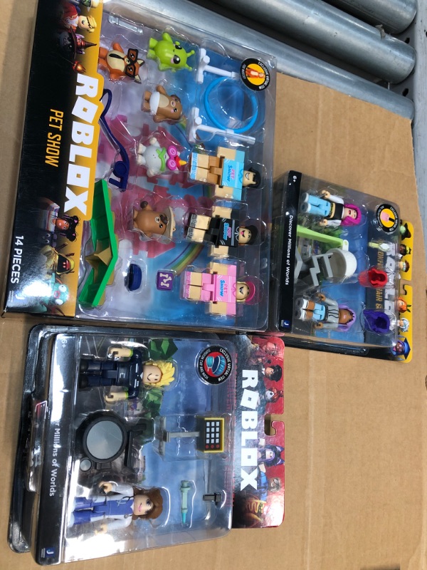 Photo 1 of Bundle of 3- assorted toys- roblox 