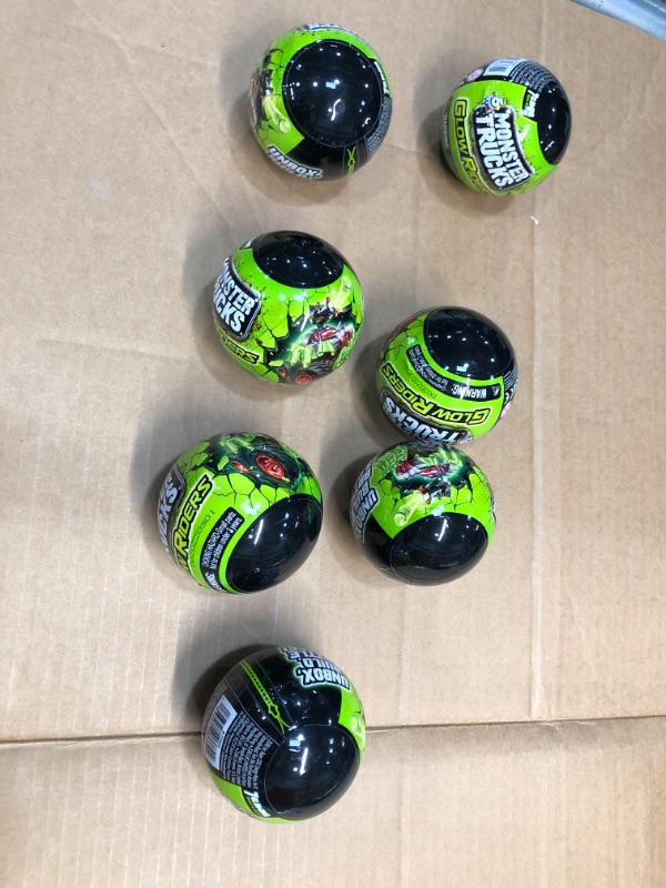 Photo 1 of 7 of - 5 Surprise Monster Trucks Glow Riders Series 2 Mystery Collectible Capsule

