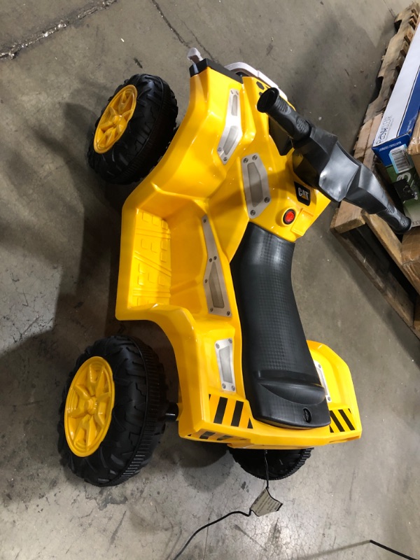 Photo 2 of DOES NOT POWER ON*
Kid Trax CAT Toddler Quad Ride On Toy, 6 Volt Battery, 1.5-3 Years Old, Max Weight 44 lbs, Single Seater, Yellow (KT1575AZ)
