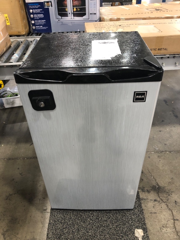Photo 1 of DIRTY* DAMAGED* NEEDS CLEANED INSIDE*
RCA RFR322 Mini Refrigerator, Compact Freezer Compartment, Adjustable Thermostat Control, Reversible Door, Ideal Fridge for Dorm, Office, Apartment, Platinum Stainless, 3.2 Cubic Feet

