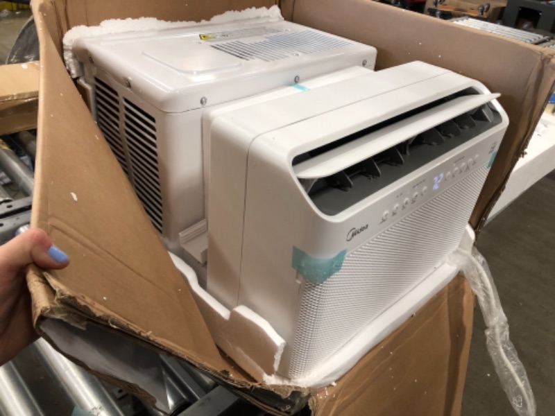 Photo 2 of Midea 12,000 BTU U-Shaped Smart Inverter Window Air Conditioner–Cools up to 550 Sq. Ft., Ultra Quiet with Open Window Flexibility, Works with Alexa/Google Assistant, 35% Energy Savings, Remote Control 19.17 x 21.97 x 13.46 inches

