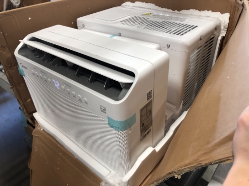 Photo 1 of Midea 12,000 BTU U-Shaped Smart Inverter Window Air Conditioner–Cools up to 550 Sq. Ft., Ultra Quiet with Open Window Flexibility, Works with Alexa/Google Assistant, 35% Energy Savings, Remote Control 19.17 x 21.97 x 13.46 inches

