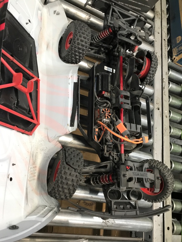 Photo 3 of **SOME PARTS ARE BROKEN AND DAMAGE TO BACK DRIVER TIRE**BATTERY MISSING**
ARRMA RC Truck 1/7 Mojave 6S V2 4WD BLX Desert Truck with Spektrum Firma (Ready-to-Run), Red/Black, ARA7604V2T2
