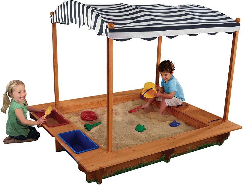 Photo 1 of **HARDWARE INCOMPLETE**
KidKraft Outdoor Covered Wooden Sandbox with Bins and Striped Canvas Canopy, Kids' Outdoor Furniture, Navy & White, Gift for Ages 2-8
