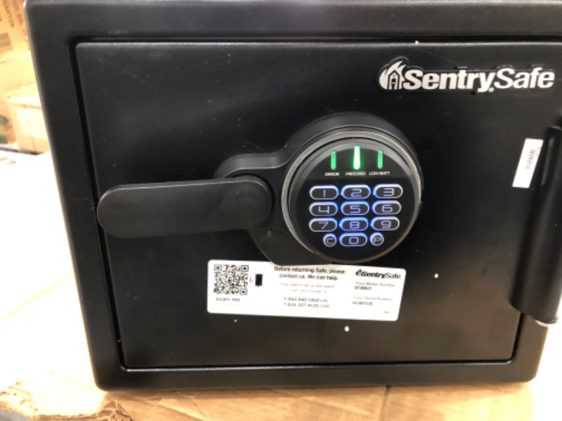 Photo 5 of **MISSING KEYS, BUT SAFE OPENS WITH BATTERIES AND CODE**
SentrySafe SFW082F Fireproof Waterproof Safe with Digital Keypad, 0.82 Cubic Feet, Black
