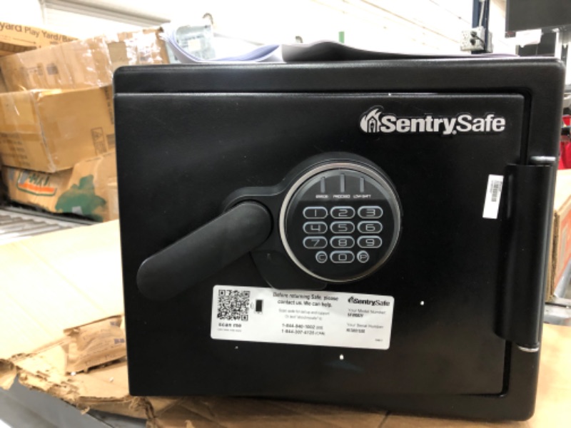 Photo 2 of **MISSING KEYS, BUT SAFE OPENS WITH BATTERIES AND CODE**
SentrySafe SFW082F Fireproof Waterproof Safe with Digital Keypad, 0.82 Cubic Feet, Black
