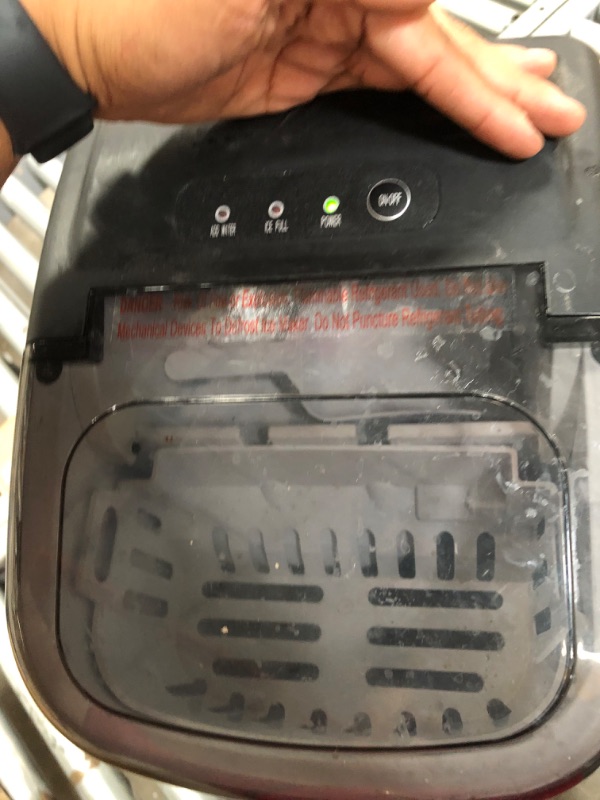 Photo 1 of Ice Maker for Countertop, Portable Ice Maker with Handle, Self-Cleaning Function, 9 Cubes Ready in 6-12 Mins, Compact Ice Machine with Scoop Easy Operation for Home/Bar
