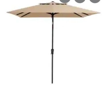 Photo 1 of 8.5 ft beige outdoor umbrella