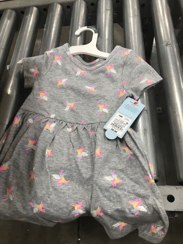 Photo 1 of pack of 12- Toddler Girls' Printed Knit Short Sleeve Dress - Cat & Jack™- size 18m