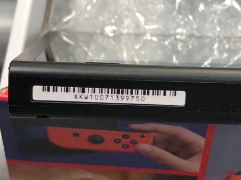 Photo 25 of Nintendo Switch with Neon Blue and Neon Red Joy-Con

