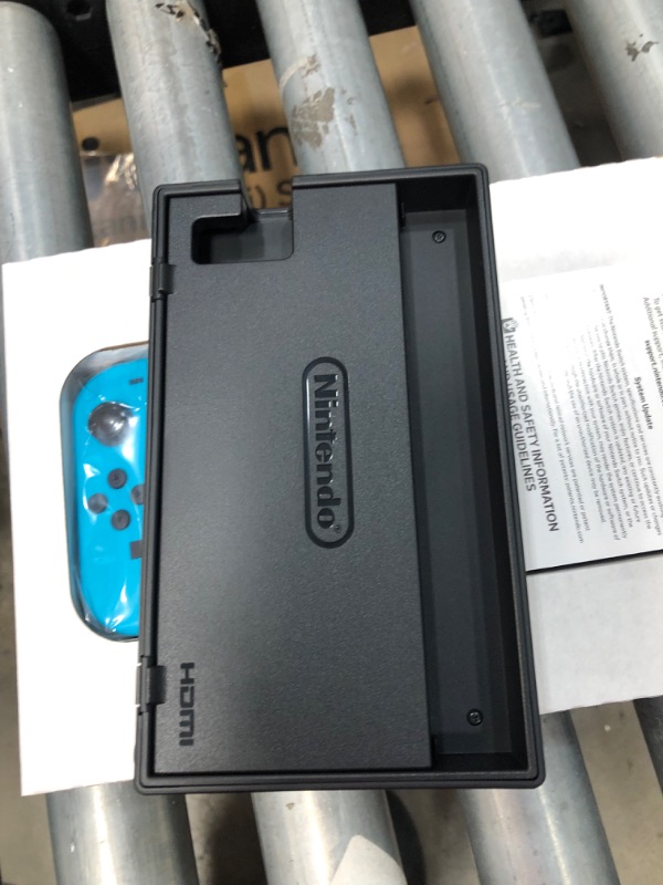 Photo 12 of Nintendo Switch with Neon Blue and Neon Red Joy-Con

