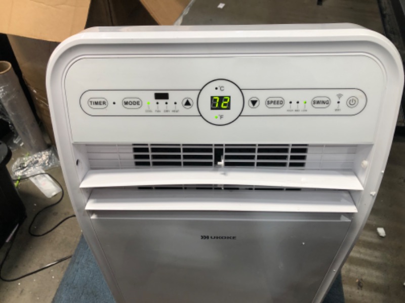 Photo 2 of PARTS ONLY DOES NOT BLOW COLD 
Ukoke USPC01W Smart WiFi Portable Air Conditioner, Works with Alexa & Mobile App Control, 12000BTU, 4 in 1 AC Unit with Cool, Heat, Dehumidifier & Fan, up to 400 Sq. ft, White
